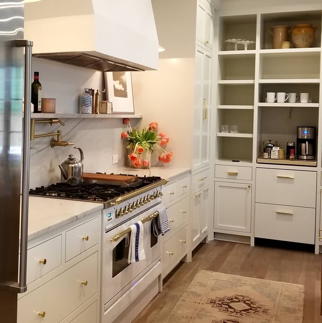 Luxury White Kitchen with Brass Harmony - European frameless cabinets in Austin, TX