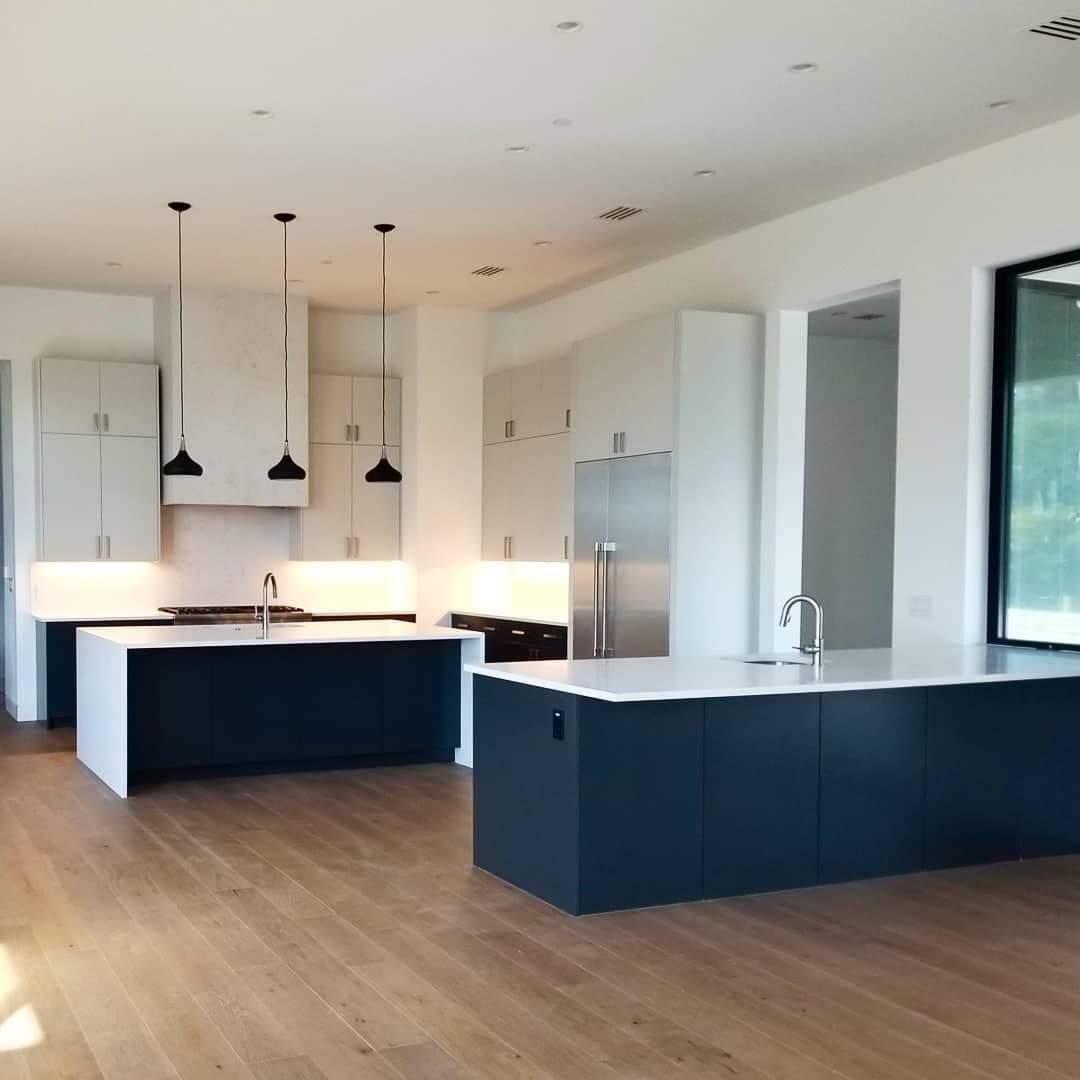 Two-Tone Modern Kitchen Symphony - European frameless cabinets in Austin, TX